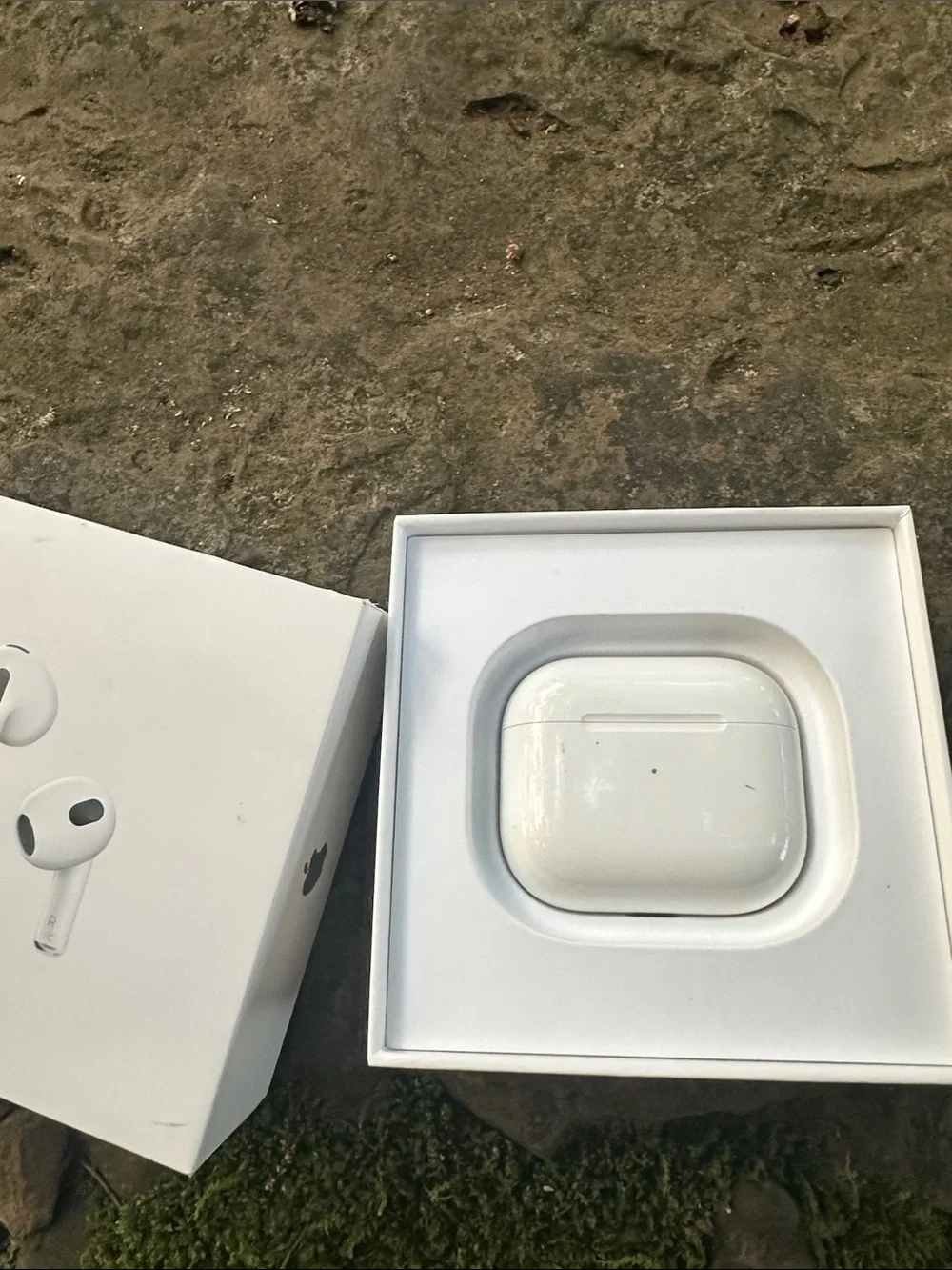 Apple AirPods 3rd generation box and charging case.